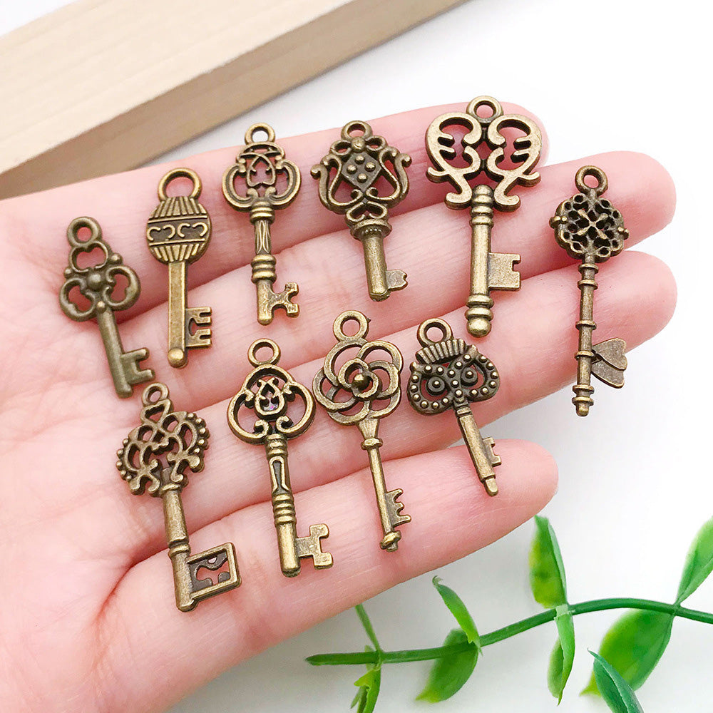 100 Pack Vintage Key Charms for DIY Jewelry Pendant