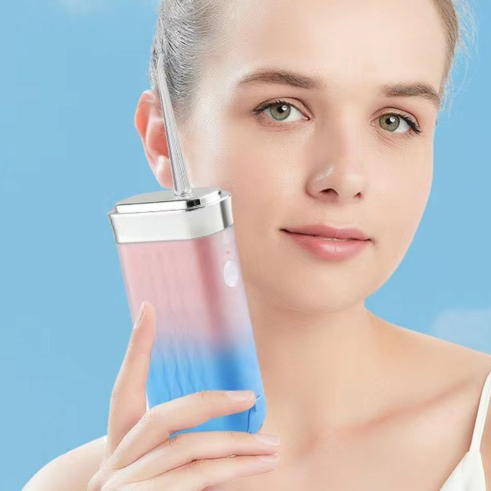Mini Portable Oral Irrigator Rechargeable Water Dental Flosser With Stretchable Water Tan-Pink