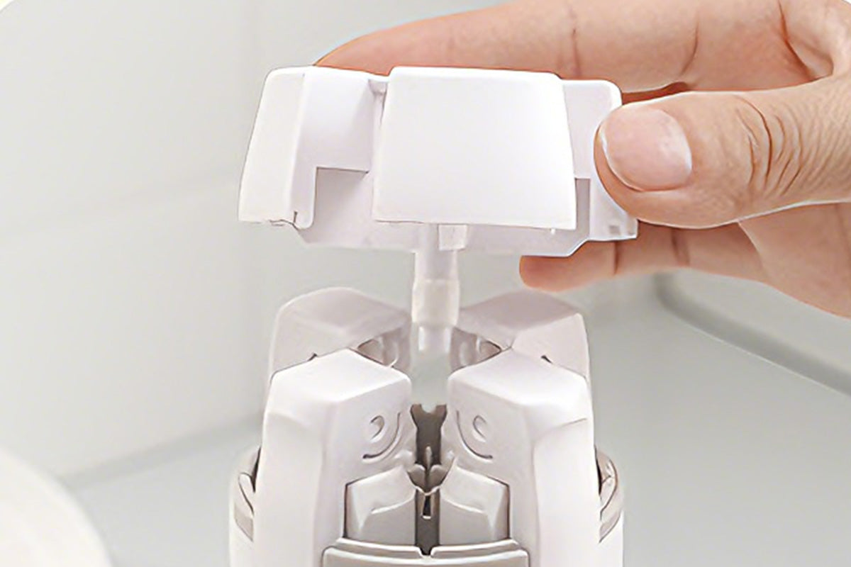 4 in 1 Travel Dispenser with 30ml Travel Bottles - White