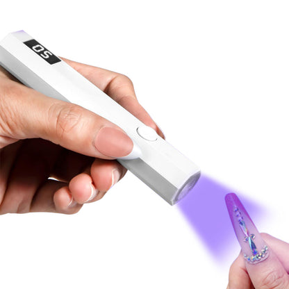 Handheld UV Nail Lamp ¨C Portable Gel Nail Dryer for Home and Salon Use White